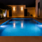 Iluminação LED instalada na parede de uma piscina, com posicionamento técnico para distribuir a luz em Goiânia.