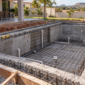 Construção de piscina em Caturaí com estrutura de concreto, ferragens e tubulações embutidas
